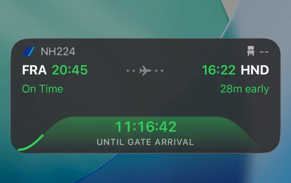 A LetsFlight Live Activity on the iPhone Lock Screen: NH224 from Frankfurt at 20:45 to Tokyo Haneda at 16:22, 28 minutes early, 11 hours 16 minutes until gate arrival.